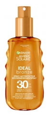 Garnier Ambre Solaire Ideal Bronze Ochrann&eacute; ml&eacute;ko ve spreji SPF30 150 ml
