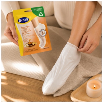 Scholl ExpertCare Hranilna maska za stopala z medom manuka 1 par