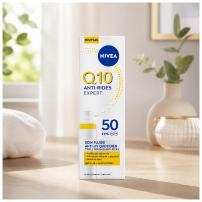 Nivea Q10 Strokovna nega proti gubam Fluidna nega z dnevnim Anti-UV SPF50 40 ml